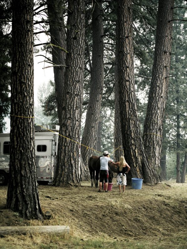 Teens with their horse at the rodeo campgrounds in Taylorsville, California.