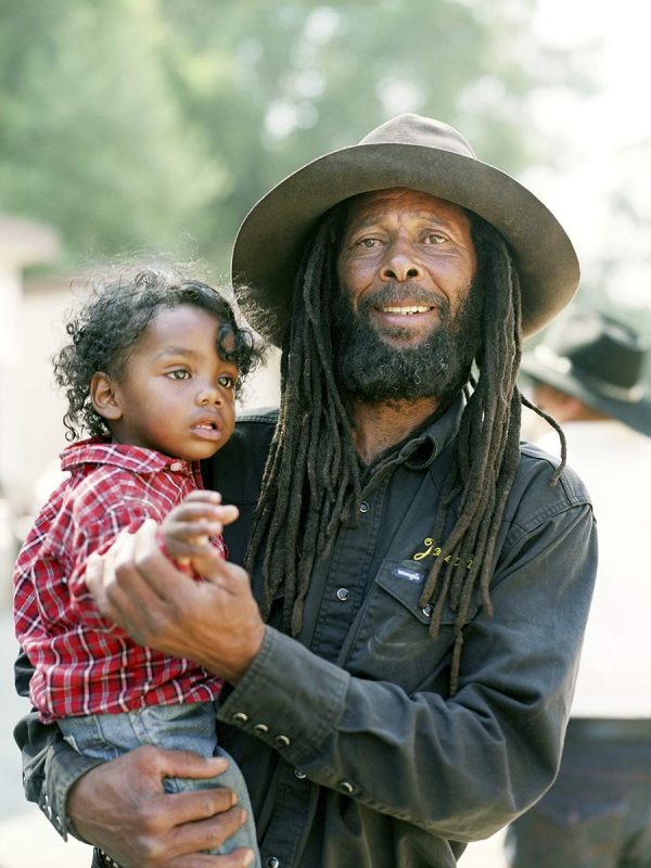 Cowboy Joseph Matthew with his grandson at The Bill Pickett Invitational Rodeo. Oakland, California. 2008